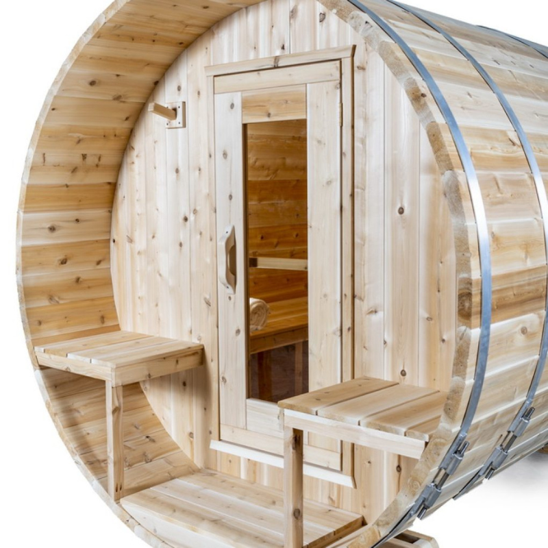 "Luxurious Dundalk LeisureCraft Sauna crafted from light-colored Eastern White Cedar with a bronze tempered glass door and a cozy front porch, designed for ultimate relaxation and wellness."