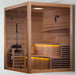 "Group of friends enjoying the luxurious and spacious Golden Designs Kuusamo Edition 6-Person Traditional Sauna, equipped with mood-enhancing chromotherapy and a high-quality sound system."