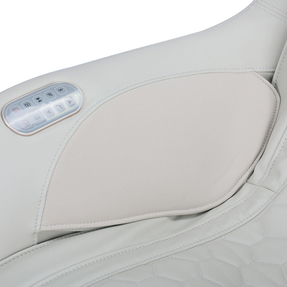 Closeup of massage chair side, armrest and controls 