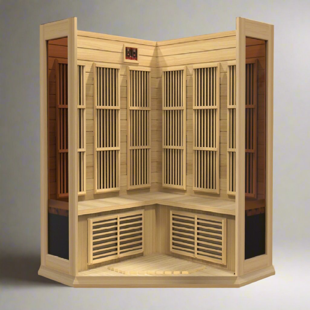 "Three people enjoying the Maxxus 3-Person Corner FAR Infrared Sauna, highlighting its space-efficient design and mood-enhancing lighting in a cozy home corner."