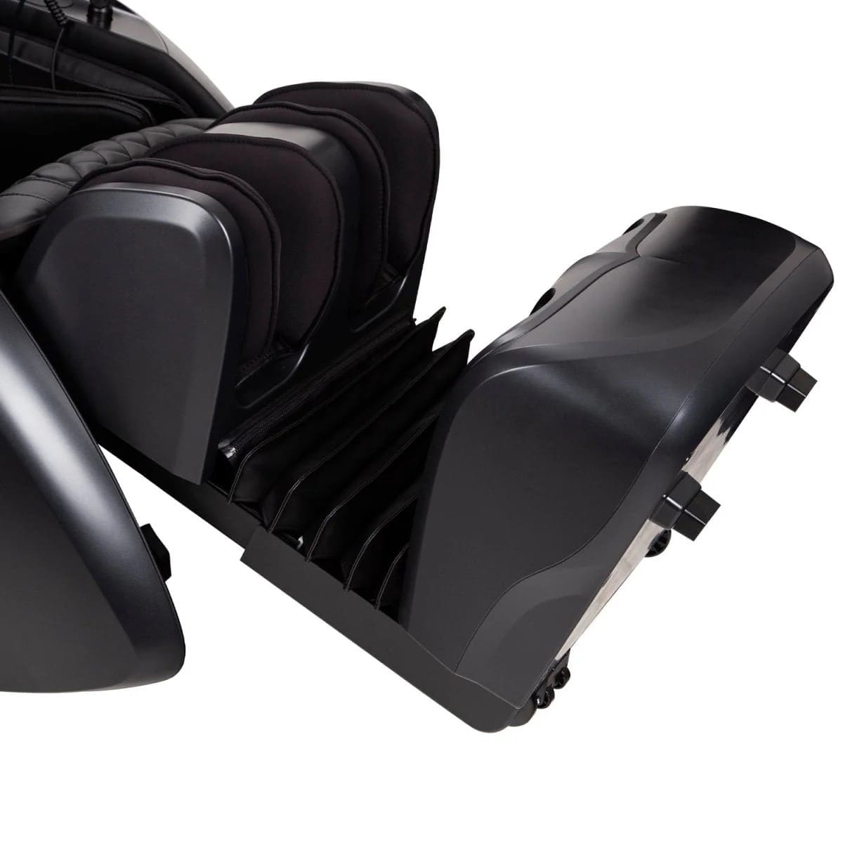 Up close image of black massage chair footrest
