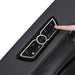 Hand pressing button on massage chair armrest control panel with AUTO center button
