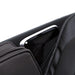 Close-up of triangular built-in speaker on massage chair shoulder panel
