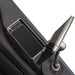 Close-up of massage chair armrest with open wireless charging tray and tablet remote