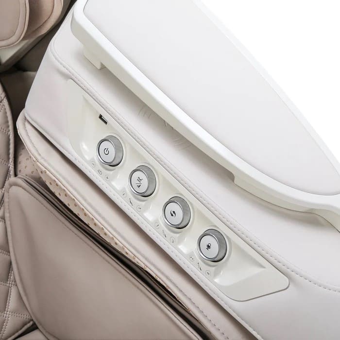 Close-up of armrest control panel with power, air, speed, and voice buttons on the OS-Pro 4D DuoMax
