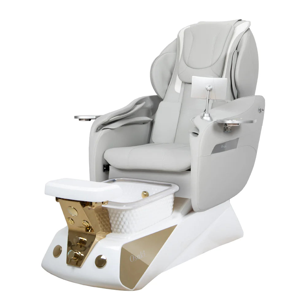 Pedicure chair with gray seat and white basin with gold accents