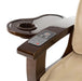 Beige massage chair top with closeup of built-in armrest remote