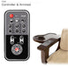 Closeup of pedicure massage chair top armrest remote next to a beige chair with wooden armrests