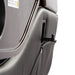 Closeup of black massage chair top with retractable pocket