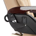 Closeup of pedicure massage chair remote placed in side pocket