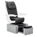 Pure III pedicure chair in black leather on a gray base with white armrests