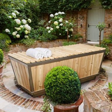 "Stylish Glacier Plunge Tub with a choice of stainless steel or white HDPE interior, encased in white cedar, designed for optimal wellness and relaxation."