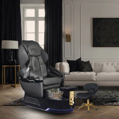 Black pedicure chair on black base with gold hardware