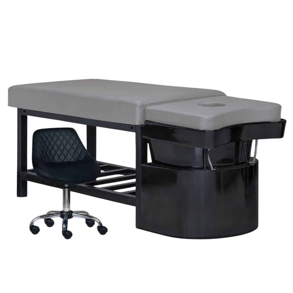 Gray shampoo bed on black base with technician chair 