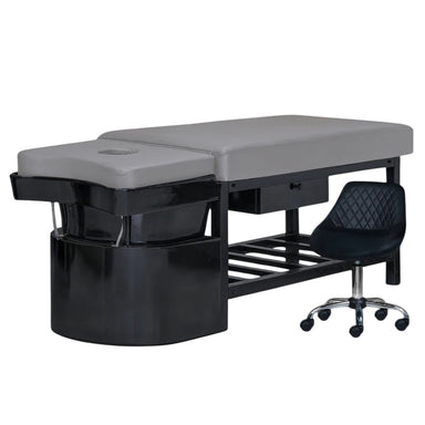 Alternate view of gray shampoo bed on black base with technician stool