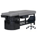 Alternate view of gray shampoo bed on black base with technician stool