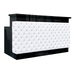 Front view of black and white tufted reception desk